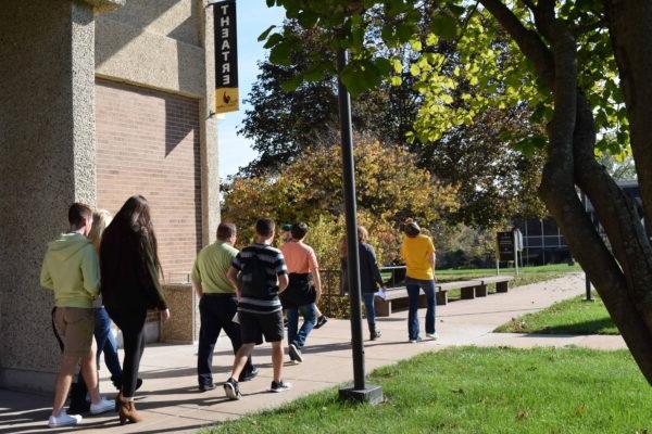 students on tour of QC Campus outside Building 1